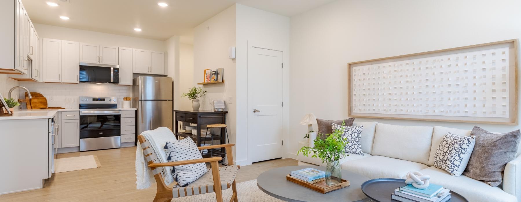 a living room with a couch and a table